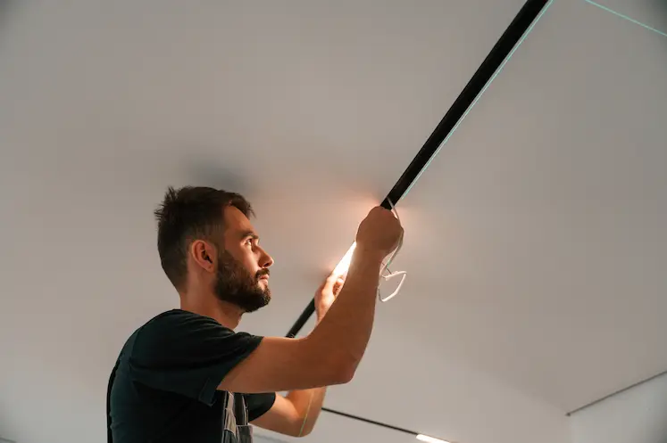 Local electrician carrying out repair work in a Reading property