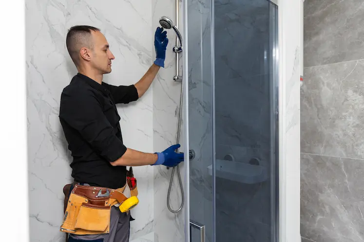Local plumber working on a fitting in Lancashire